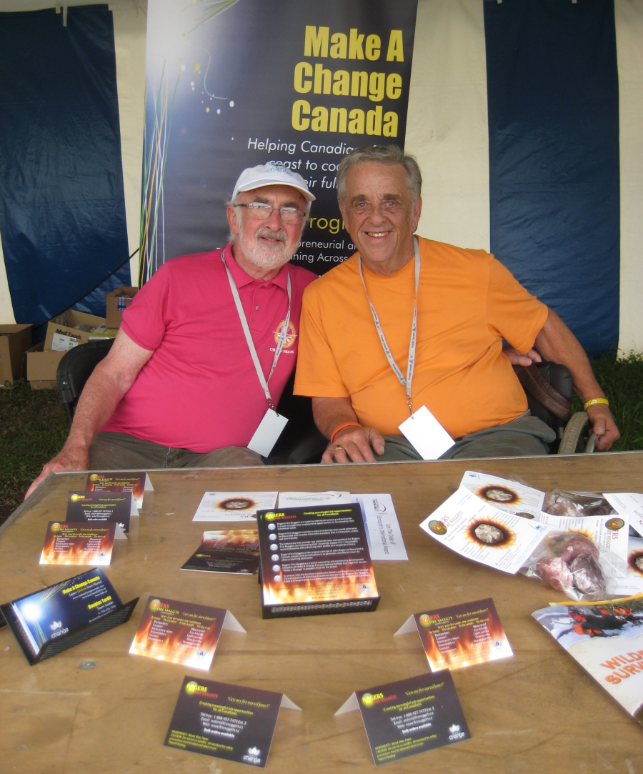 Doug Tardif, Make A Change Canada Team Leader (left), and John Rogers, Inventor of Rogers Fire Nuggets (right), during the Scouts Canada Annual Jamboree in Elderbank, Nova Scotia